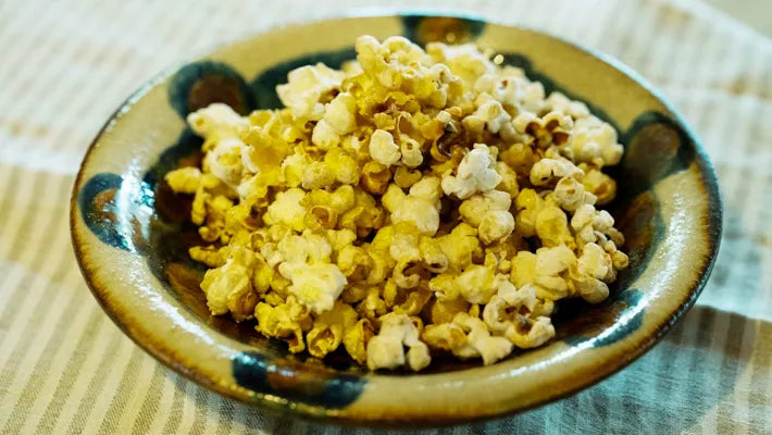 Popcorn sprinkled with soy sauce and mirin